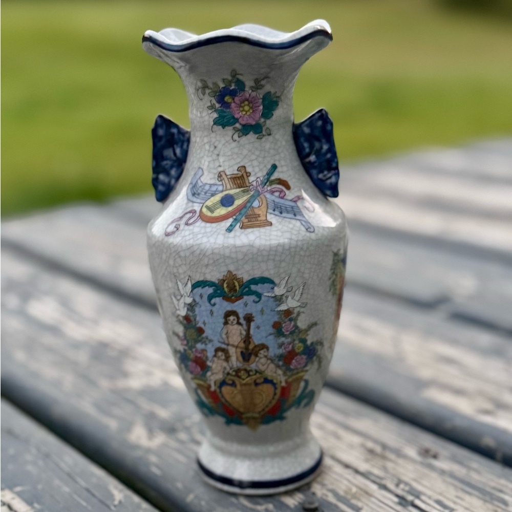 Elegant Ceramic Vase with Blue and Floral Accents